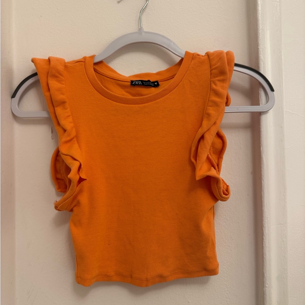 Orange ruffle sleeve top
